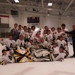 Bantam B poses with the tournament hardware after defeating DU 3-0 in the championship ga